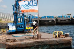 Werk op werf met eoc vlag