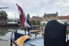 motortjalk EIGEN WIJZE met Nederlandse vlag