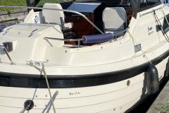 motorboot SCAND 25 langs de kant