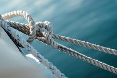 closeup-ship-wires-with-sea_181624-16117