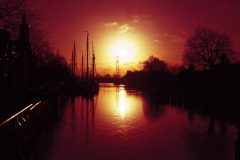 zonsondergang op water